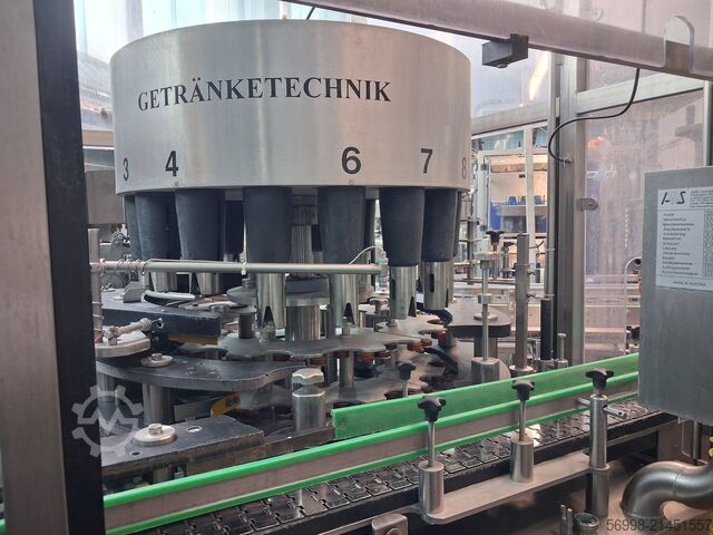 Içecek üretim makinesi AMS Bügelverschliesser