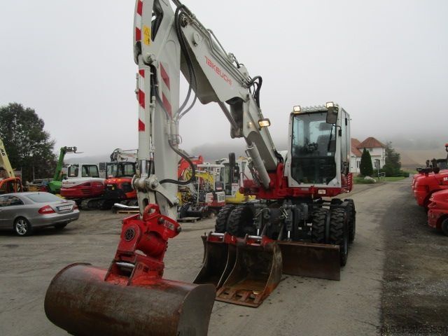 Mobilbagger Takeuchi TB295W - POWERTILT + Schnellwechsler + 3 Löffel