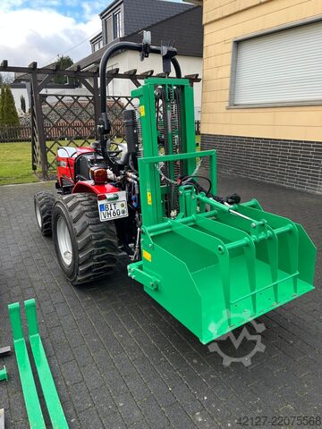 Traktor hátsó emelővillával és talajmaróval Fieldtrac 918 D