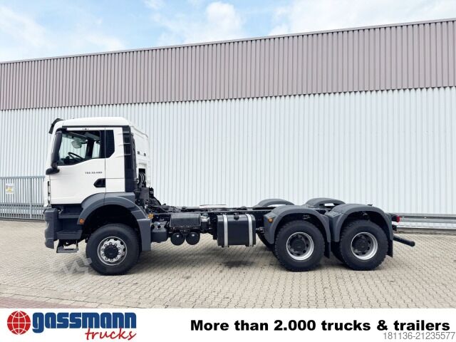 Special purpose truck MAN TGS 33.480 6x6 BB CH, Hohe Bauart, Stahlmulde ca.