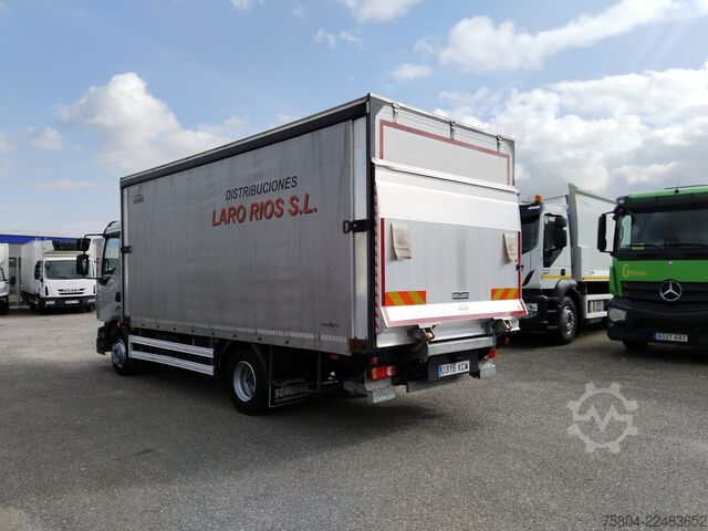 Plattewagen met zeil Volvo FL 240