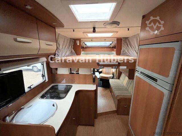 Teilintegriertes Wohnmobil CARADO T 348 - Hub/Festbett - Klima - Garage -