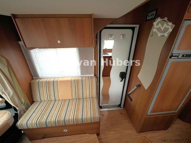 Teilintegriertes Wohnmobil CARADO T 348 - Hub/Festbett - Klima - Garage -