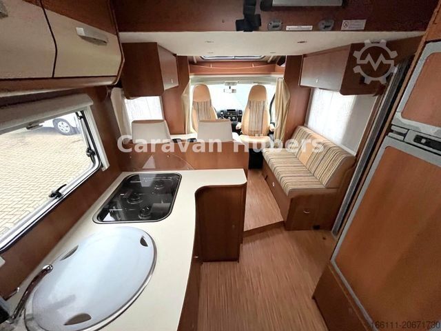 Teilintegriertes Wohnmobil CARADO T 348 - Hub/Festbett - Klima - Garage -