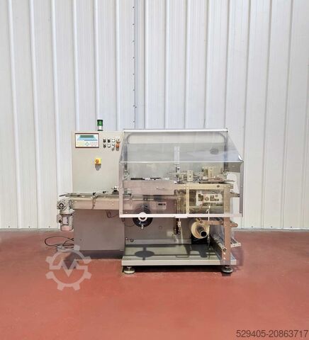 Cellofaneermachine / Automatische horizontale wikkelmachine met wisselende bewegingen. CAM AP