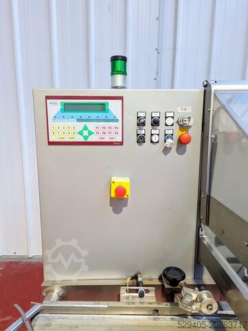 Cellofaneermachine / Automatische horizontale wikkelmachine met wisselende bewegingen. CAM AP