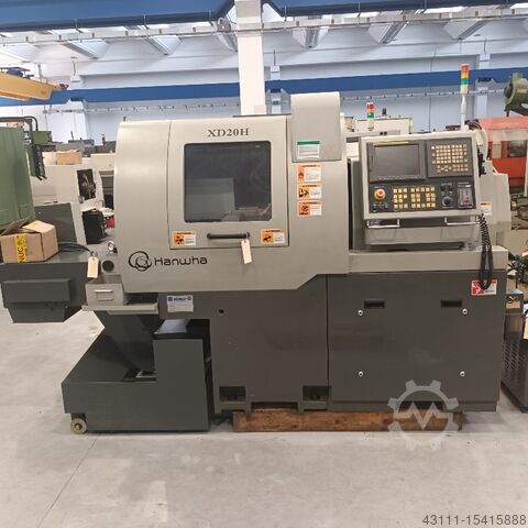 Torno cnc de cabezal móvil de cinco ejes Hanwha XD-20H