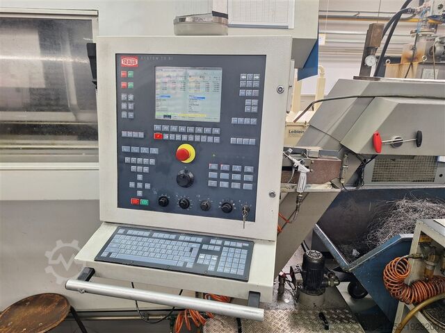 Centro de torneamento e fresagem CNC TRAUB TNX 65