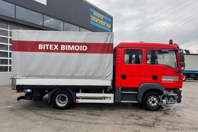 Camion cu platformă și prelată MAN TGL 12.240 4x2 ADR
