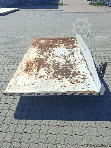 Laserový řezací stroj / odpad z plechu / TRUMPF Restgitterpalette / Holztransport