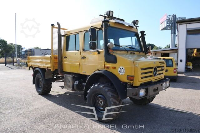 Vrachtauto met open laadbak unimog U4000 437/25 DoKa EURO-5