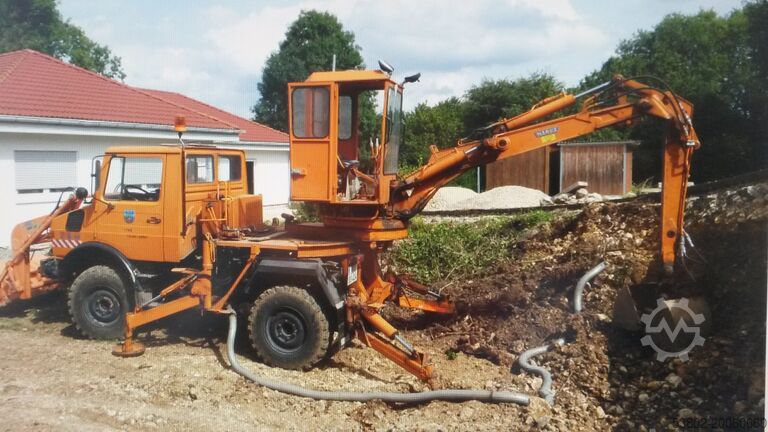 Unimog graafmachine voorlader Mercedes-Benz Unimog U424/U1000