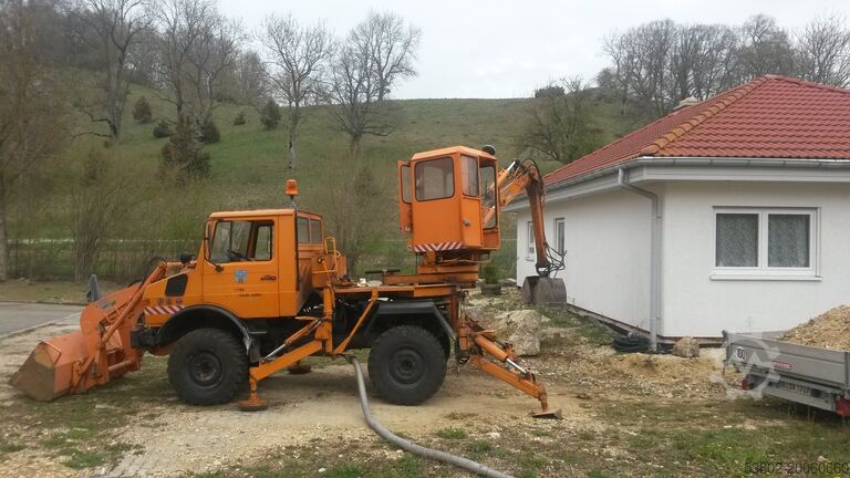 Unimog graafmachine voorlader Mercedes-Benz Unimog U424/U1000