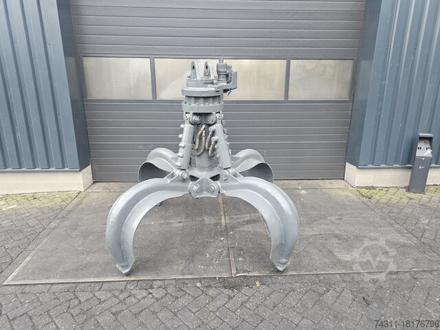 Mobiele graafmachine liebherr gm 64 scrap grab poliepgrijper orange peel