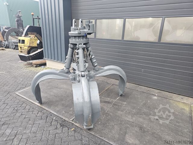 Mobiele graafmachine liebherr gm 64 scrap grab poliepgrijper orange peel