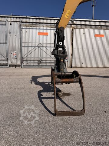 Material handler (wheeled excavator) Caterpillar MH3024