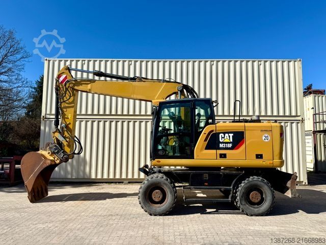 Mobile excavator CATERPILLAR M318F / 9.852 H / Deutsche Maschine