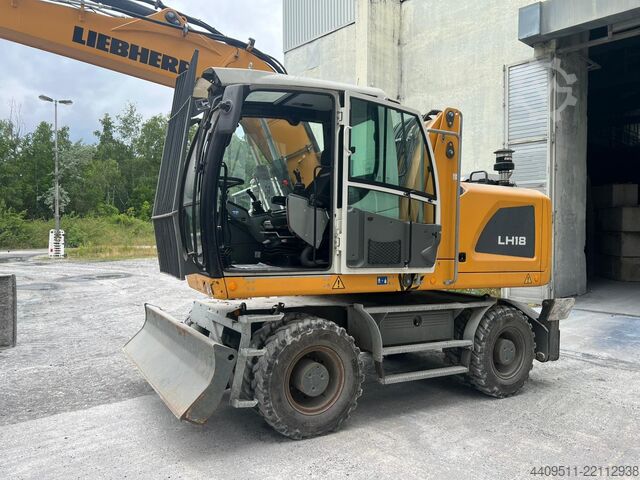 Excavadora de ruedas Liebherr con garra clasificadora Liebherr LH 18 M Litronic