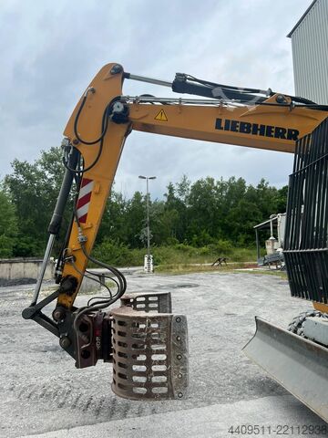 Excavadora de ruedas Liebherr con garra clasificadora Liebherr LH 18 M Litronic