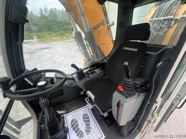 Excavadora de ruedas Liebherr con garra clasificadora Liebherr LH 18 M Litronic