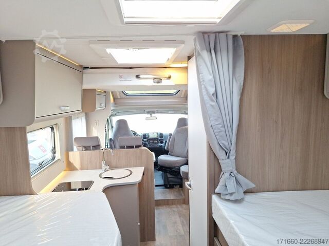 Teilintegriertes Wohnmobil CARADO pro+ T 338 TV/SAT, Navi+RFK, Hubbett