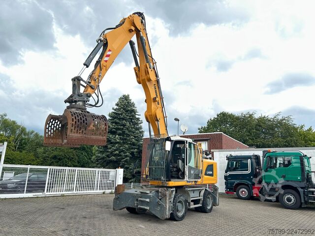 Gumikerekes kotrógép LIEBHERR LH 24 Litronic mit Abbruch- / Sortiergreifer