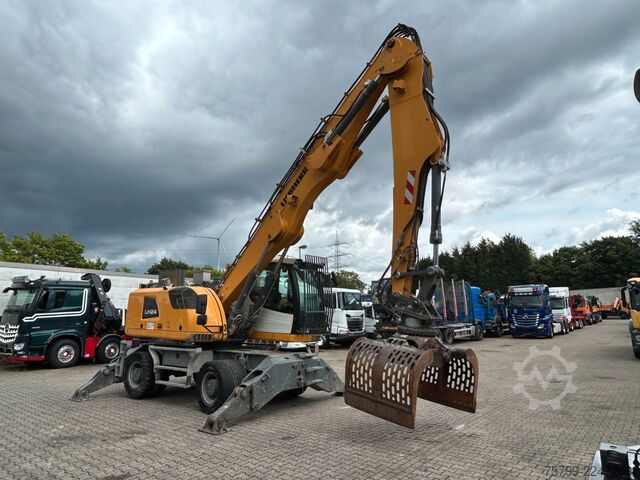 Gumikerekes kotrógép LIEBHERR LH 24 Litronic mit Abbruch- / Sortiergreifer