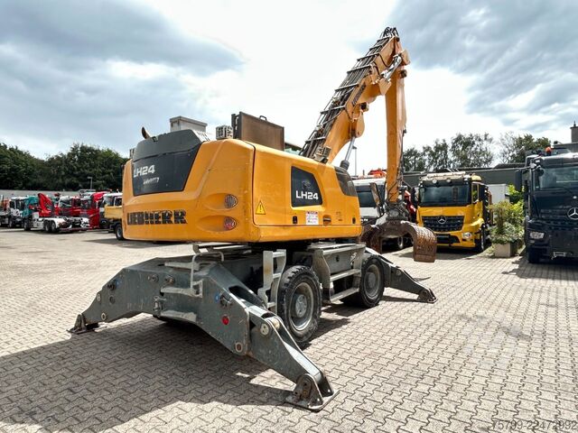 Gumikerekes kotrógép LIEBHERR LH 24 Litronic mit Abbruch- / Sortiergreifer