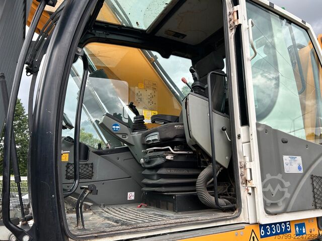 Gumikerekes kotrógép LIEBHERR LH 24 Litronic mit Abbruch- / Sortiergreifer