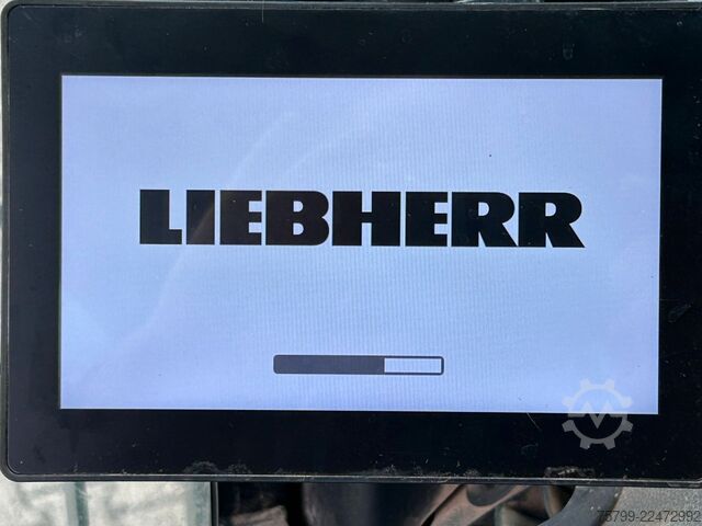 Gumikerekes kotrógép LIEBHERR LH 24 Litronic mit Abbruch- / Sortiergreifer
