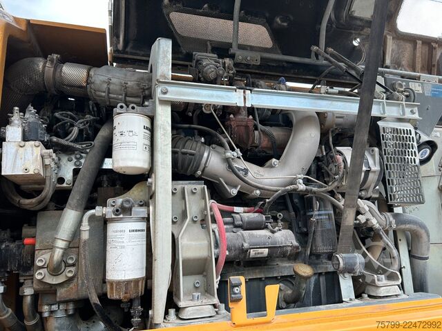 Gumikerekes kotrógép LIEBHERR LH 24 Litronic mit Abbruch- / Sortiergreifer