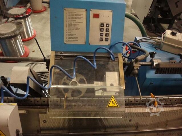 Saddle stitcher with feeder and three cutting MÜLLER MARTINI Tempo