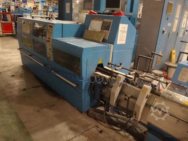 Saddle stitcher with feeder and three cutting MÜLLER MARTINI Tempo