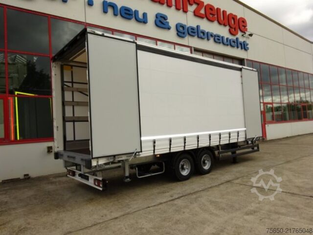 Open trailer with tarp Möslein TPW 105 D Schwebheim  Tandem- Planenanhänger Durchladen