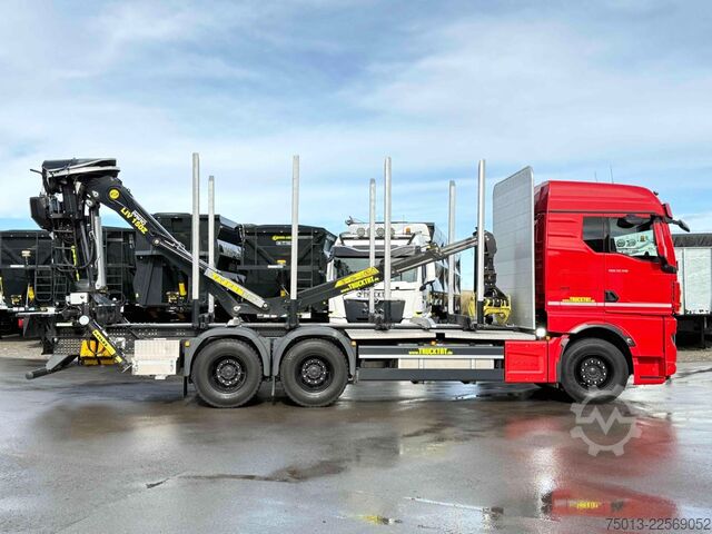 Camião florestal MAN TGX 33.510 BL CH 6X4 mit TajfunLIV 150Z96,MIETE?