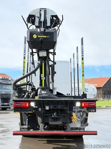 Camião florestal MAN TGX 33.510 BL CH 6X4 mit TajfunLIV 150Z96,MIETE?