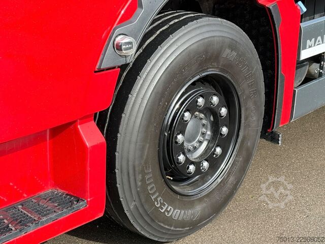 Camião florestal MAN TGX 33.510 BL CH 6X4 mit TajfunLIV 150Z96,MIETE?