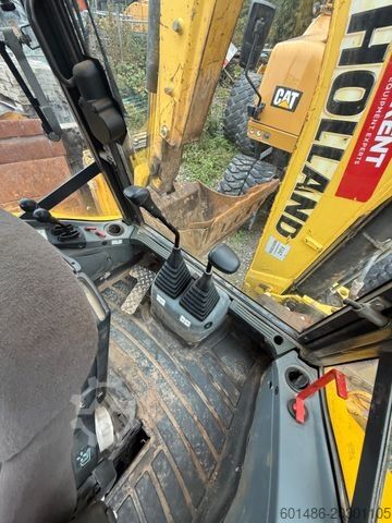 Baggerlader NEW HOLLAND B 115 c