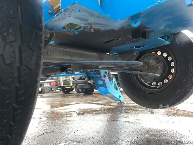 Podnośnik wysięgnikowy montowany na przyczepie Genie TZ34 (12m)