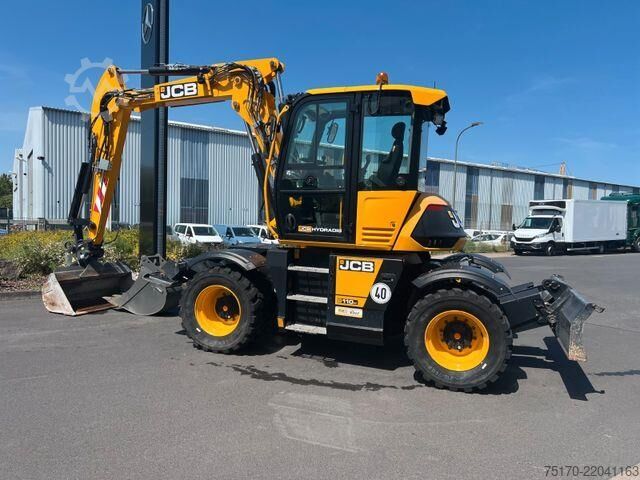 Excavator pe roți JCB Hydradig 110W / Pratzen / nur 179h / Löffelpaket