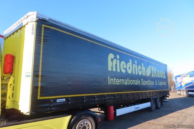 Semi-reboque aberto com lona KRONE 2 Achs Planenauflieger - Ladebordwand