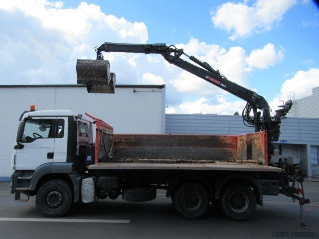 Billenő teherautó MAN 26.440 / 6 x 4 / Jonsered 1100 / Greifer