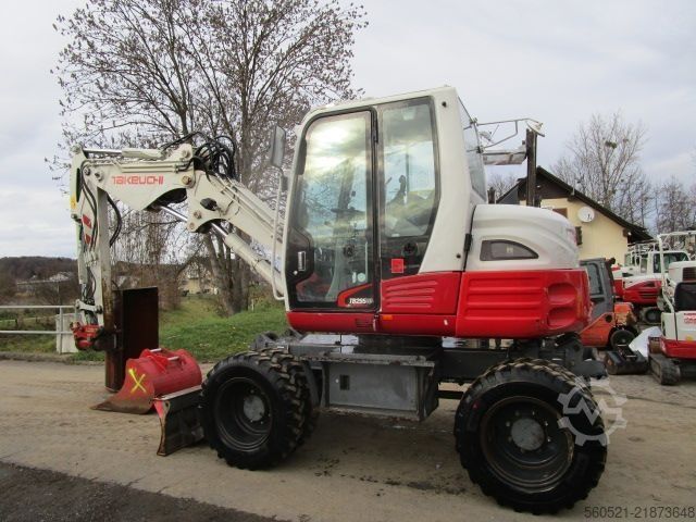 τροχοφόρος εκσκαφέας Takeuchi TB 295W - POWERTILT + Schnellw + 3 Löffel