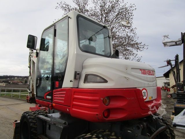 τροχοφόρος εκσκαφέας Takeuchi TB 295W - POWERTILT + Schnellw + 3 Löffel