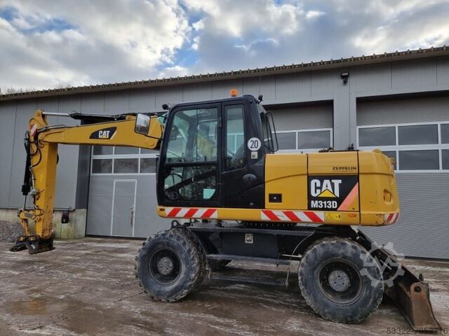 Mobile excavator Caterpillar - Only 4000 hrs! Caterpillar M313D