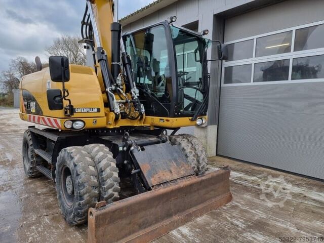 Mobile excavator Caterpillar - Only 4000 hrs! Caterpillar M313D