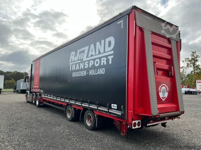 Semirimorchio con telone MEUSBURGER 2-Achs-Gabelstaplertransporter Rampe Dhollandia