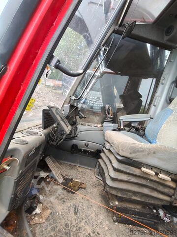 Moissonneuse-batteuse avec tête de récolte Komatsu 941.1