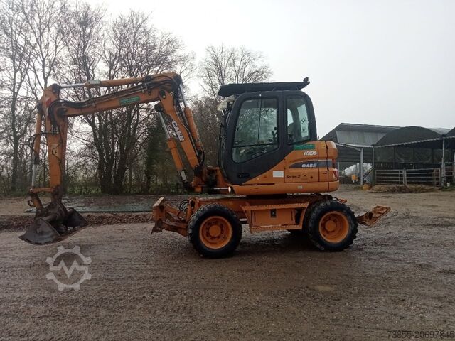 Wheeled Excavator Case WX95 with 4 excavator buckets and forks