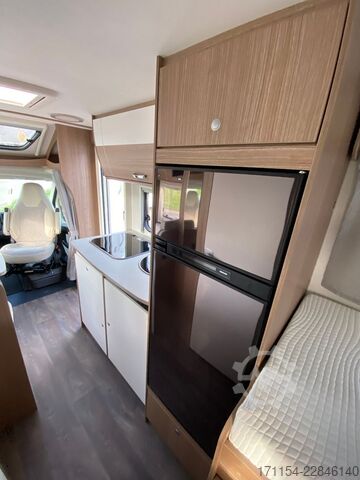 Half-integraal camper CARADO T 337, mit Klima, Solar,SAT,Längsbetten